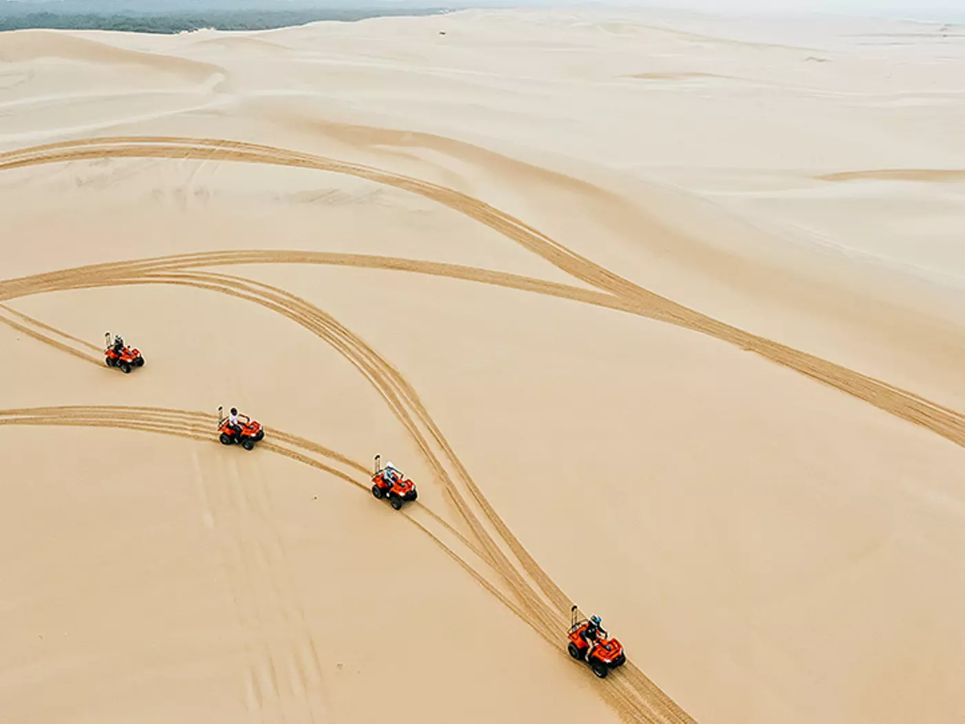 Explore the largest sand dunes in the southern hemisphere at Port Stephens. Photo Destination NSW