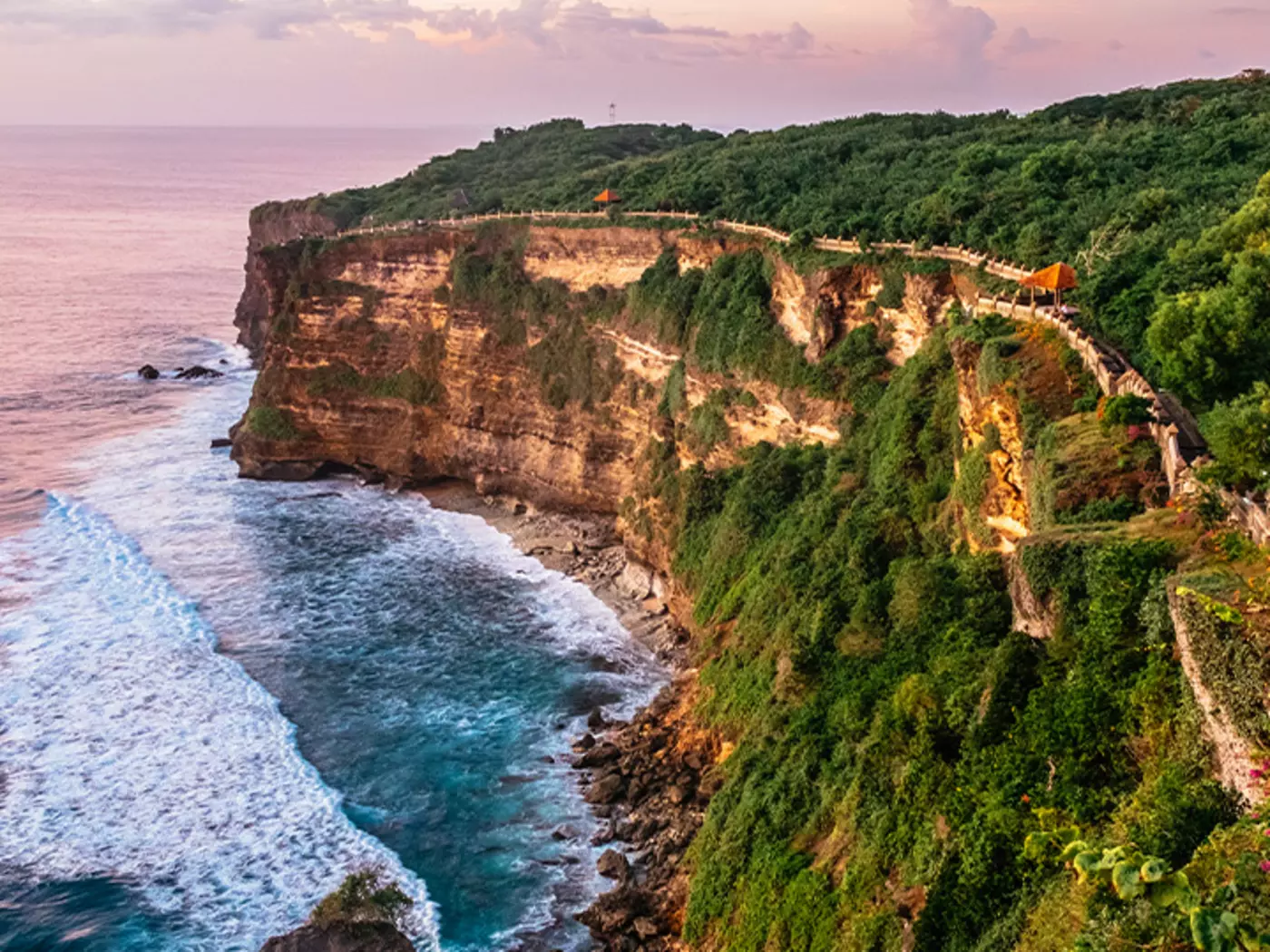 Admire the sensational views of Uluwatu, hosting a glorious vision of cliffs, waves, and coast