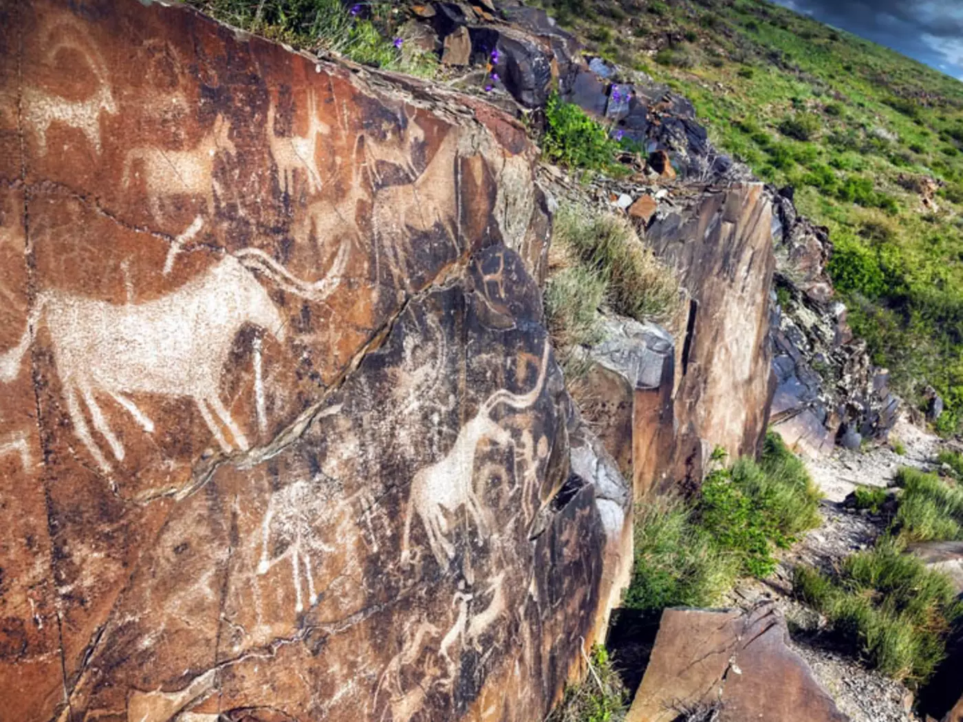 Tamgaly, Kazakhstan is a World Heritage site featuring an impressive series of petroglyphs