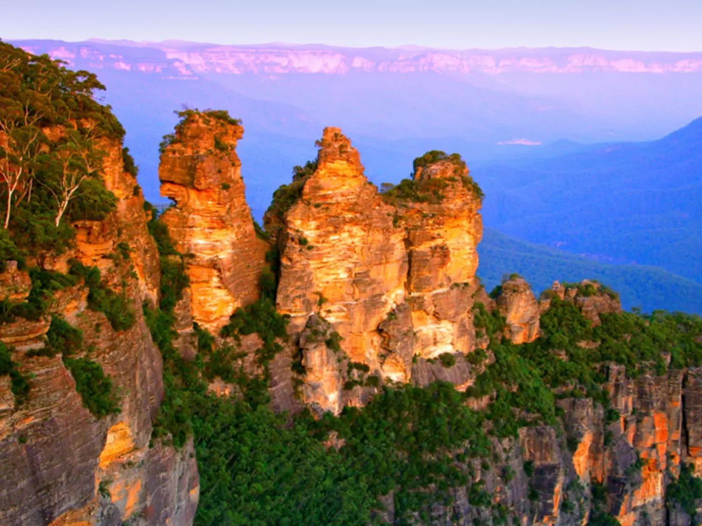 A breathtaking view of The Three Sisters, a towering sandstone formation and sacred aboriginal site, at Blue Mountains National Park