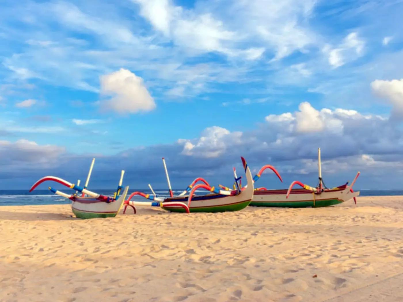 Traditional Balinese fishing boats on beach at Nusa Dua