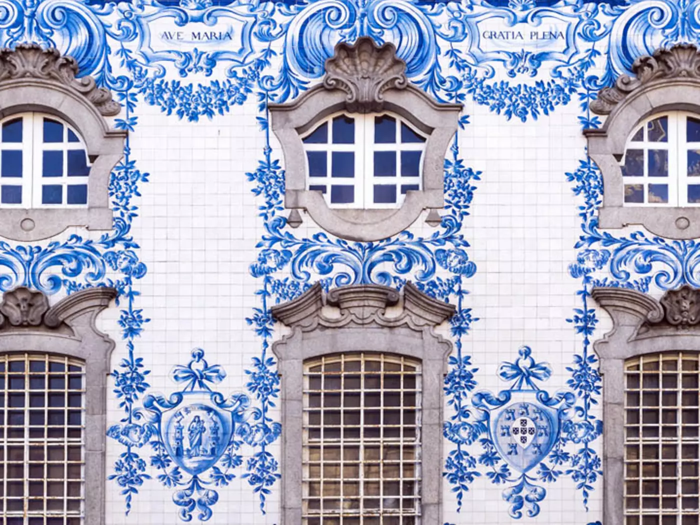 The buildings of Porto's Praca de Ribeira area are covered in glazed tiles