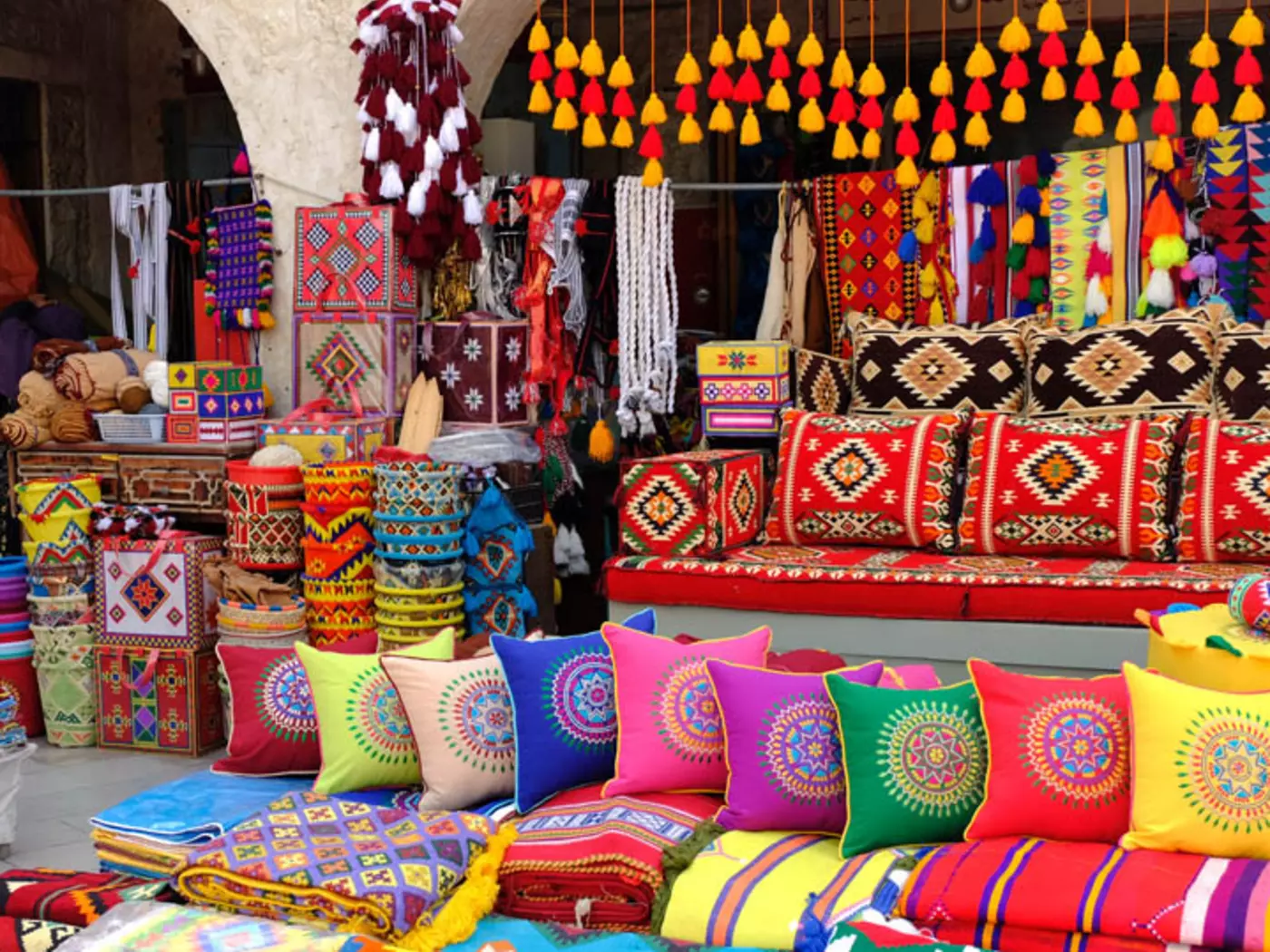 Delve deep into the Qatari culture as you explore the local Souq Waqif market that boasts a range of colorful textiles and more!