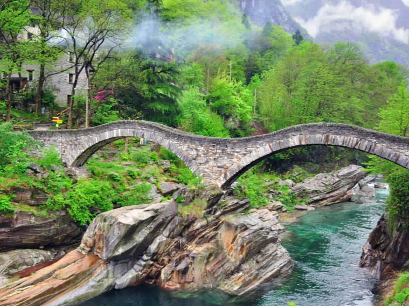 Completed 400 years ago the "Ponte dei Salti" stone bridge soars over the turquoise Verzasca