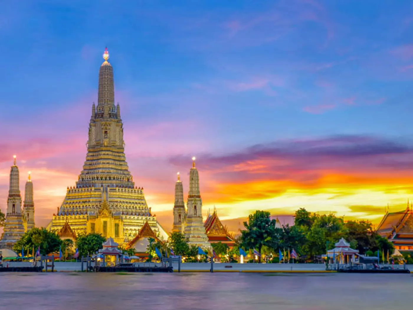 Wat Arun, nicknamed the Temple of Dawn sits on the banks of the Chao Phraya River