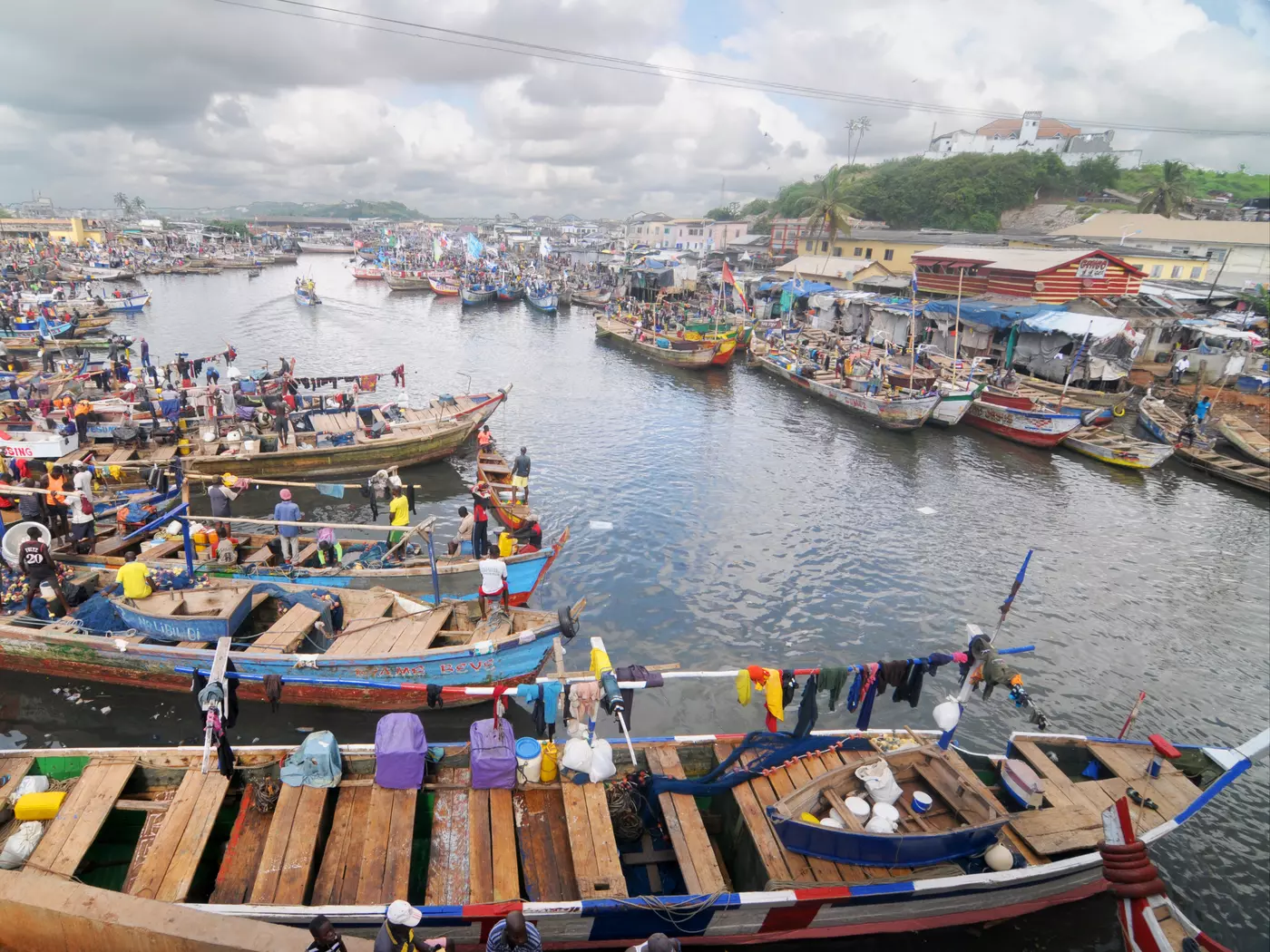 Visit the vibrant fishing community of Elmina