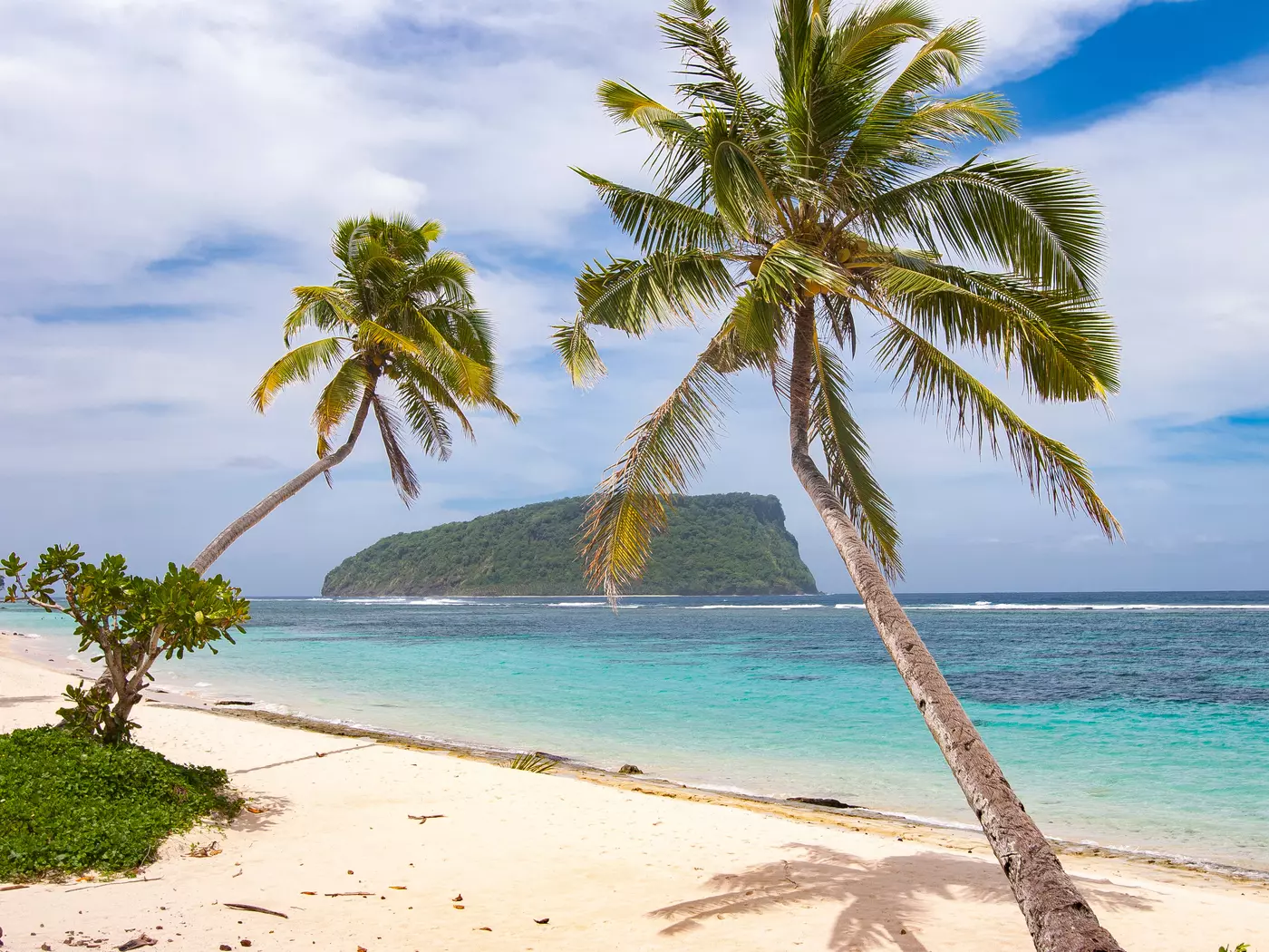 Wander the sandy shores of Samoa