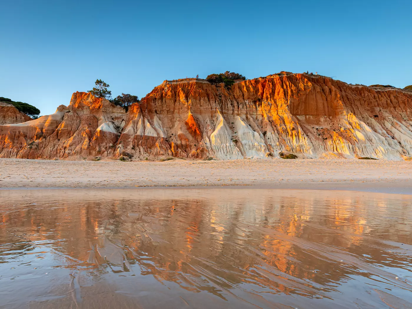 Walk in the cooling coastal waters of Algarve