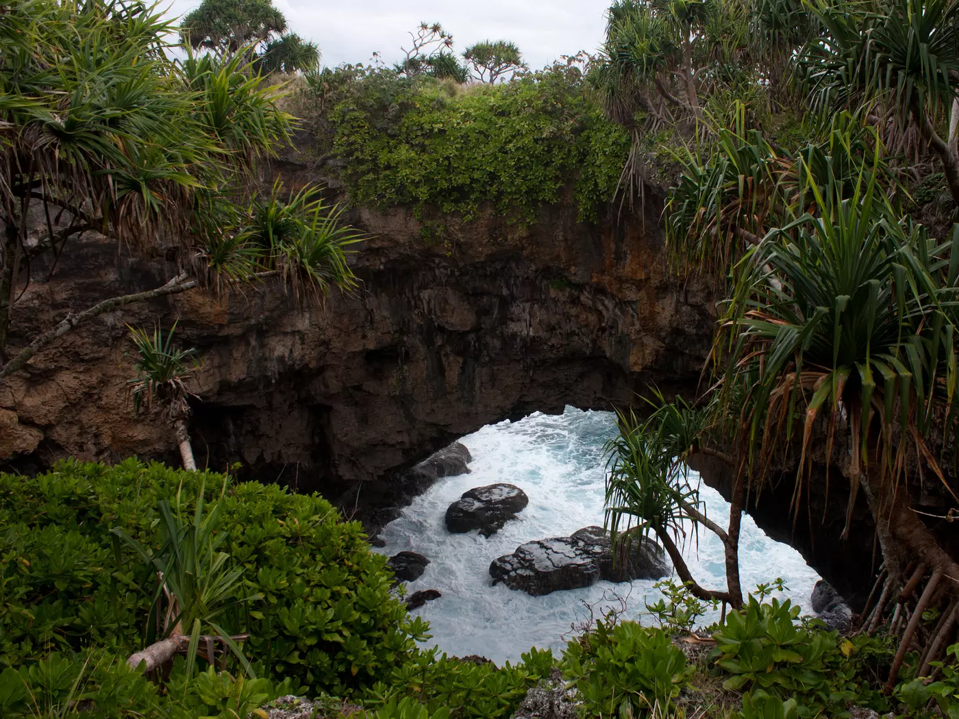Looking through the Hufangalupe Arch in Tongatapu, Tonga