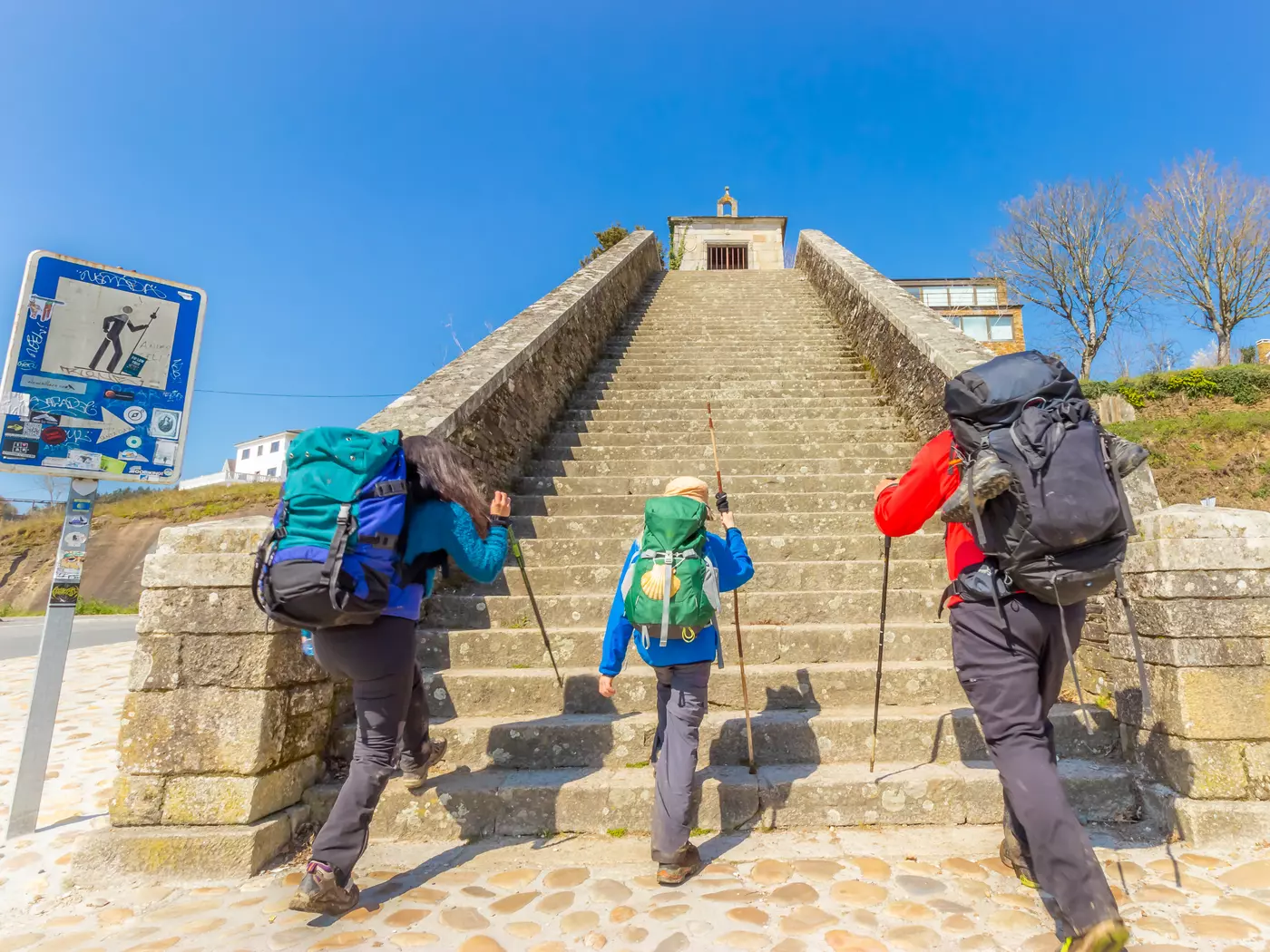 Pilgrims entering Portomarin, Way of St James Pilgrimage Trail, Camino de Santiago