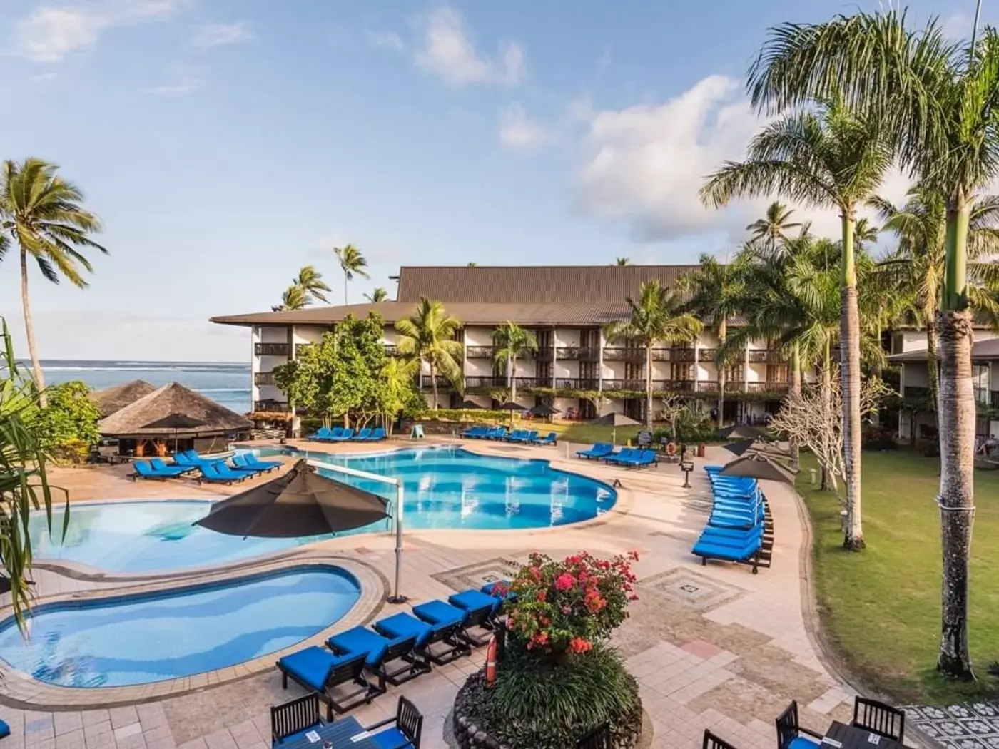 Relax by the pool at the Warwick