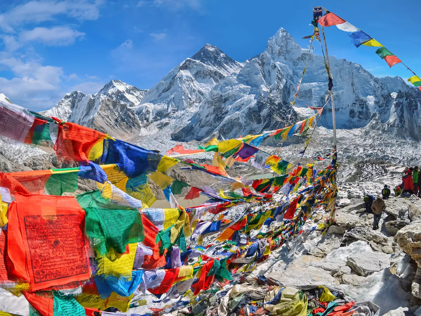 View of Mount Everest and Nuptse with buddhist prayer flags from kala patthar in Sagarmatha National Park in the Nepal Himalaya