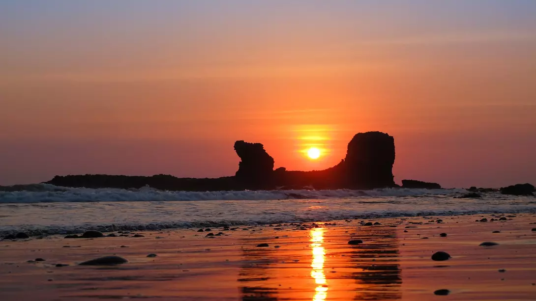 El Salvador Sunset Through Rock in El Salvador
