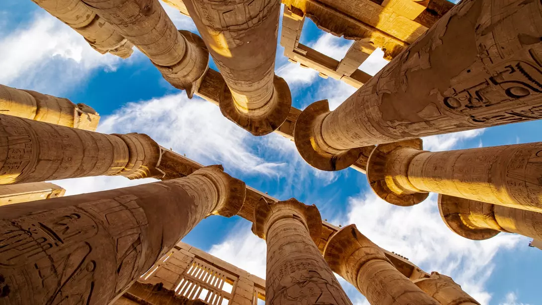 Karnak Temple, Luxor, Egypt view of ancient temple pillars into the sky