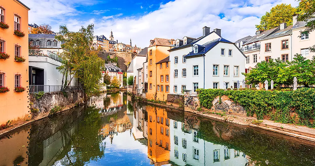Houses reflecting in the Alzette River Houses reflecting in the Alzette River