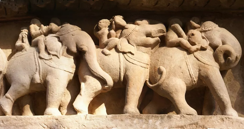 Elephant sculptures on base of Lakshmana Temple is a great photo opportunity on India vacations. Elephant sculptures on base of Lakshmana Temple is a great photo opportunity on India vacations.