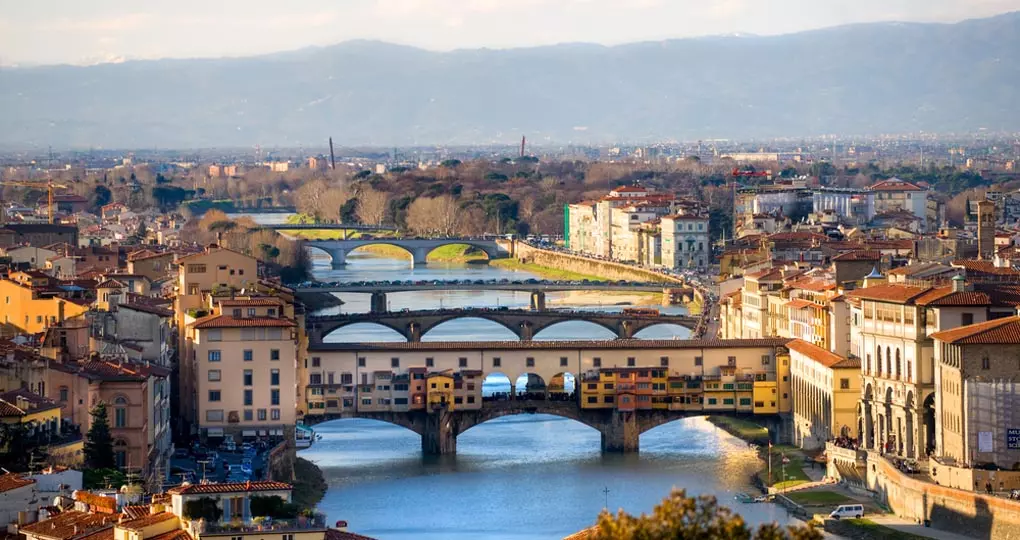 Panoramic view of Florence and Ponte Vecchio - a must inclusion on your Italy vacation. Panoramic view of Florence and Ponte Vecchio - a must inclusion on your Italy vacation.
