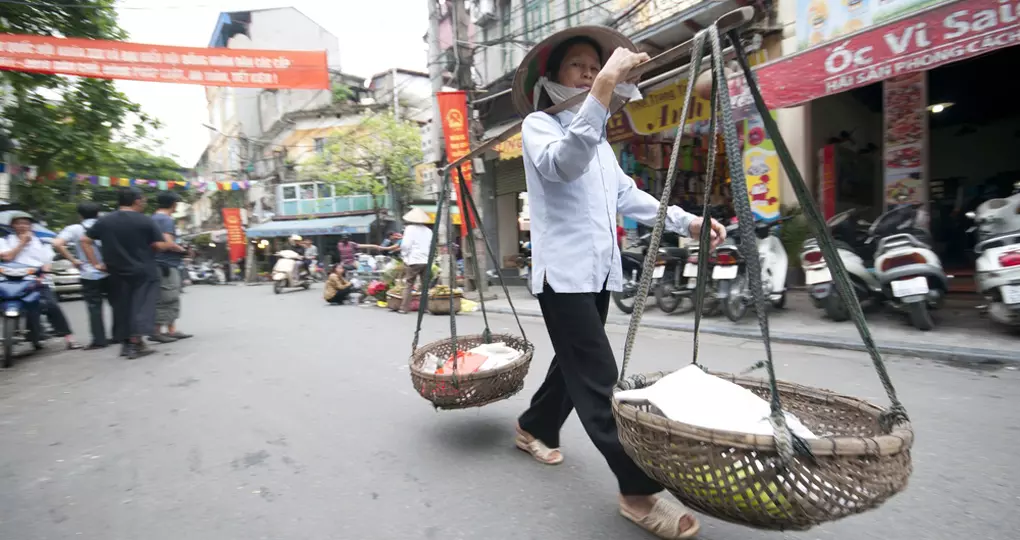 A road side peddler sells fresh fruit