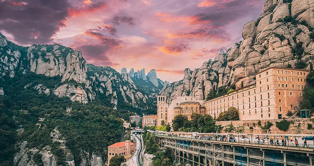 Take a day trip out of Barcelona to stop at Santa Maria de Montserrat, a stunning cliffside Monastery Take a day trip out of Barcelona to stop at Santa Maria de Montserrat, a stunning cliffside Monastery