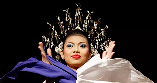 A women from the indigenous Iban people performs