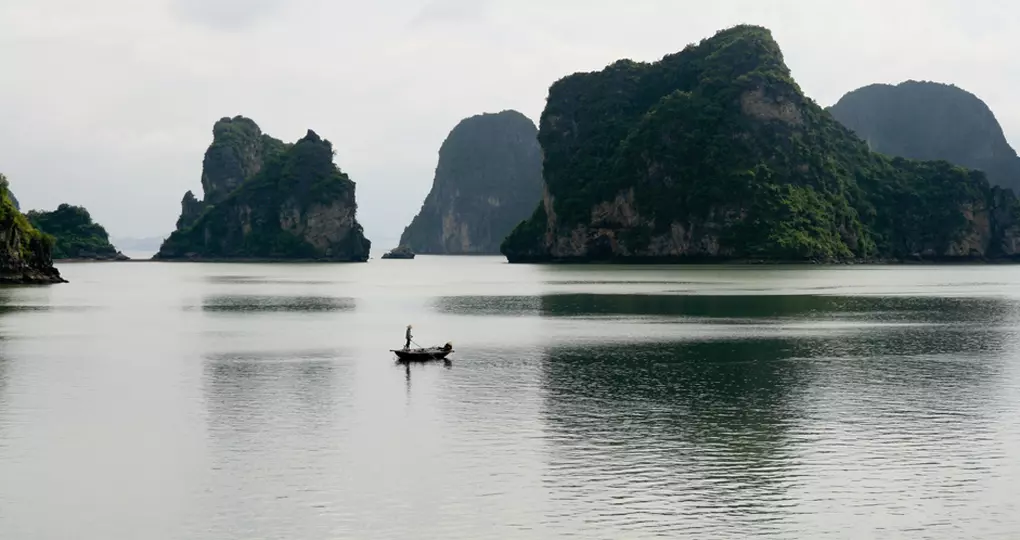 Halong Bay features thousands of limestone karsts and isles Halong Bay features thousands of limestone karsts and isles