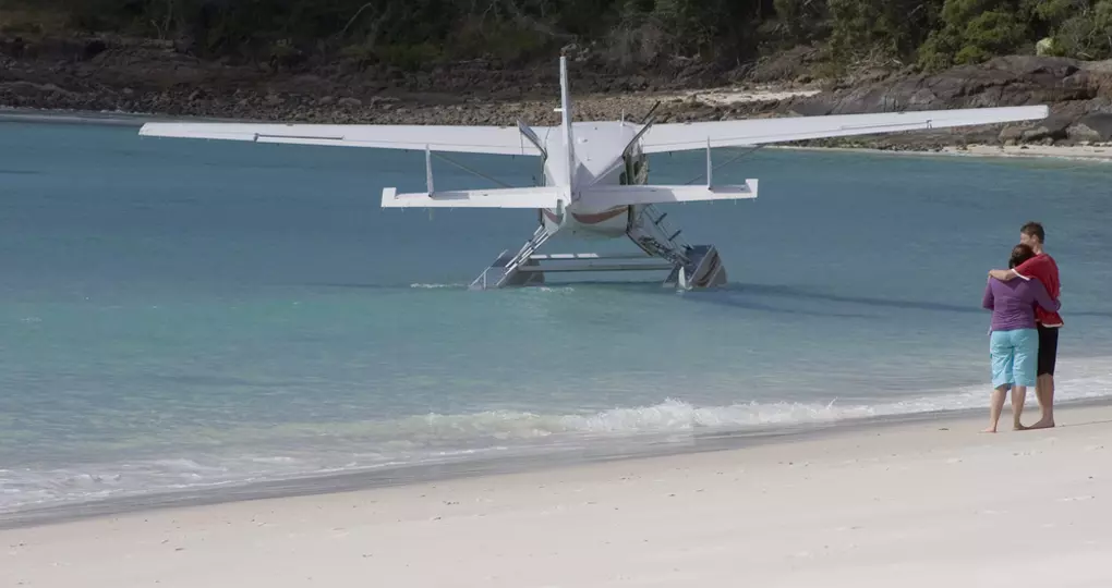 Sea plane anchored on Whitehaven Beach