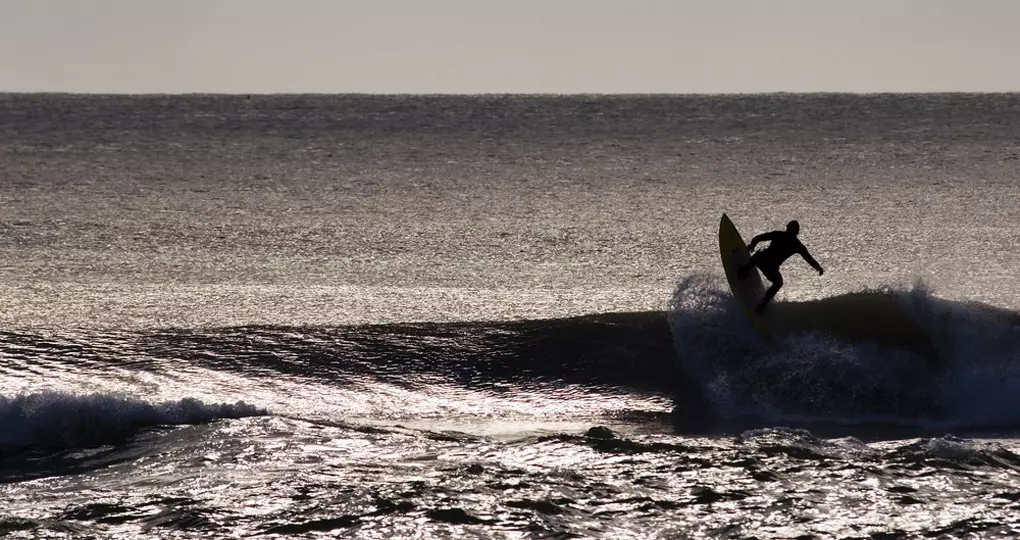 Surfing the break at Haumoana beach
