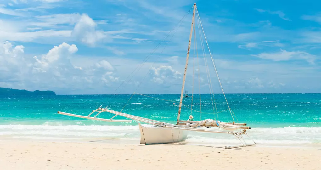 A traditional paraw sailing boat