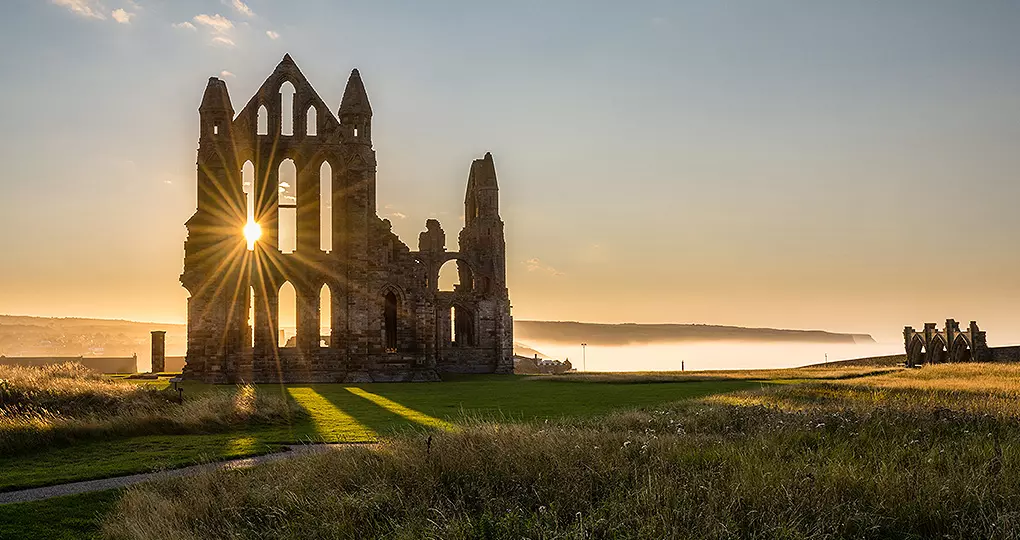 Step through history while exploring the ruins of Whitby Abbey Step through history while exploring the ruins of Whitby Abbey