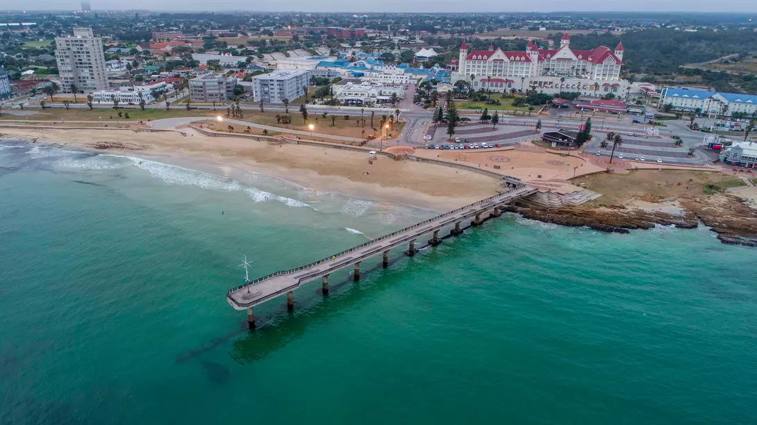 Shark Rock Pier Aerial view of Shark Rock Pier in Port Elizabeth, South Africa. The pier juts out into Algoa Bay, with the city skyline in the background.