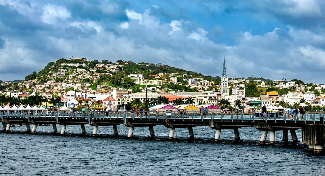 Bridge across the Demerara river toward colorful cityscape of Georgetown in Guyana