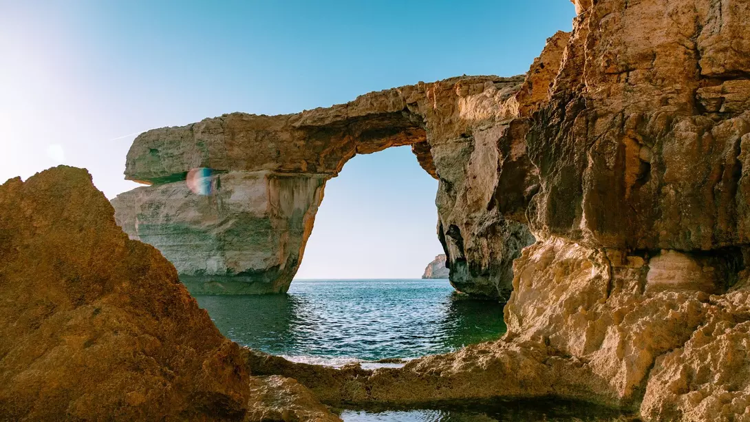Azure window of the Gozo island - lime rock in a shape of arch (window) standing in the sea