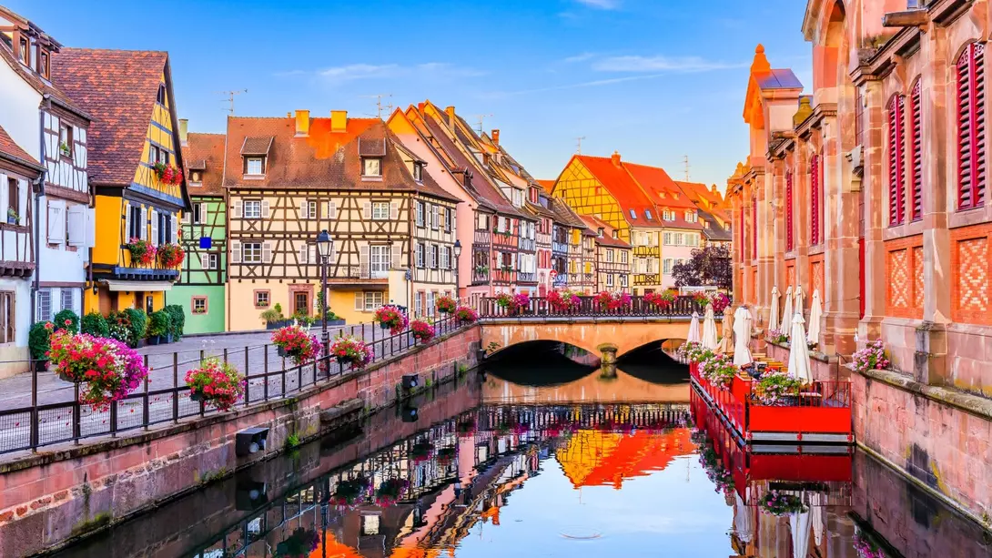 Colmar, Alsace, France - Water canal and traditional half timbered houses