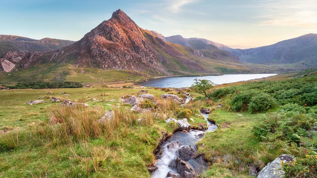 Evening light on Mount Tryfan above Llyn Ogwen in Snowdonia National Park in Wales