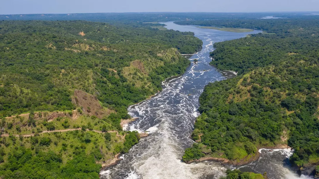 Murchison Falls (also known as Kabalega Falls) at the Nile River in Uganda. The Falls are in the Murchison Falls National Park, which is one of the main tourist destinations in Uganda.
