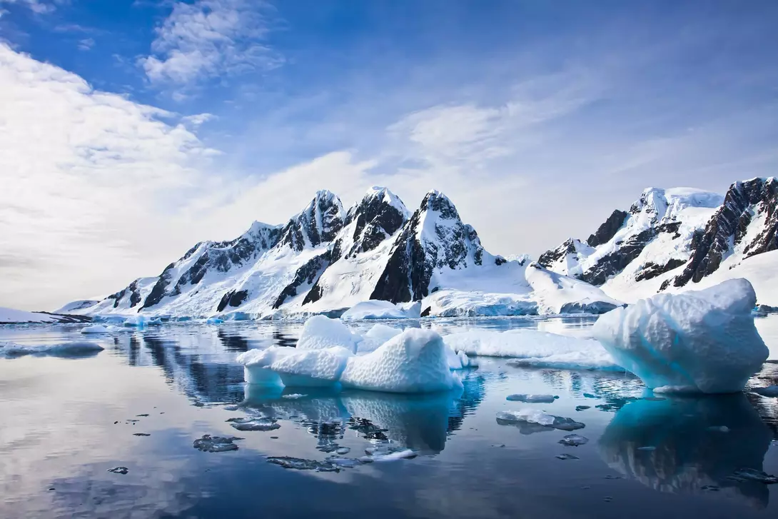 Snow-capped Mountains Beautiful snow-capped mountains against the blue sky in Antarctica