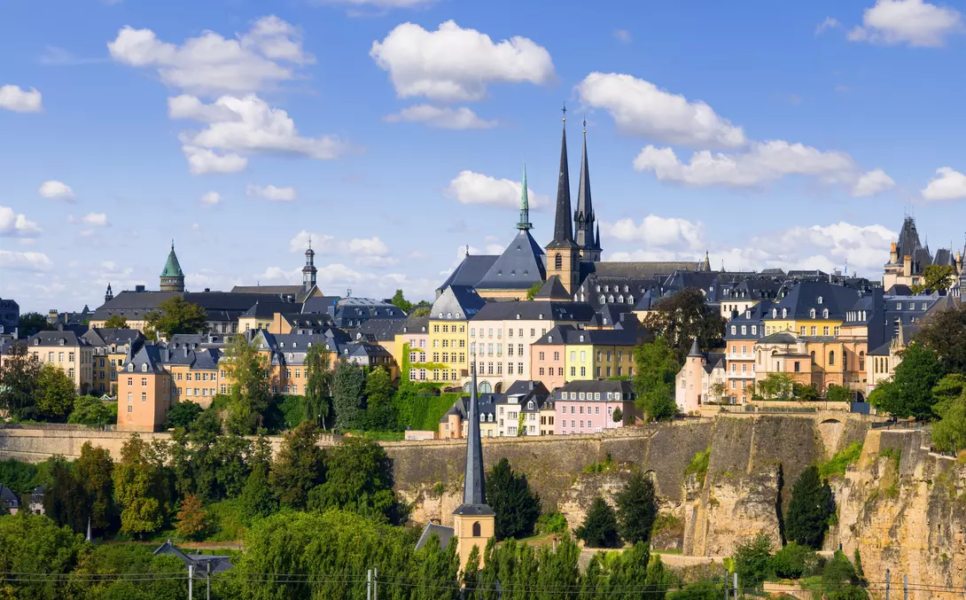 View of the Luxembourg Old Town with the towers of the Notre Dame Cathedral under a nicely clouded sky