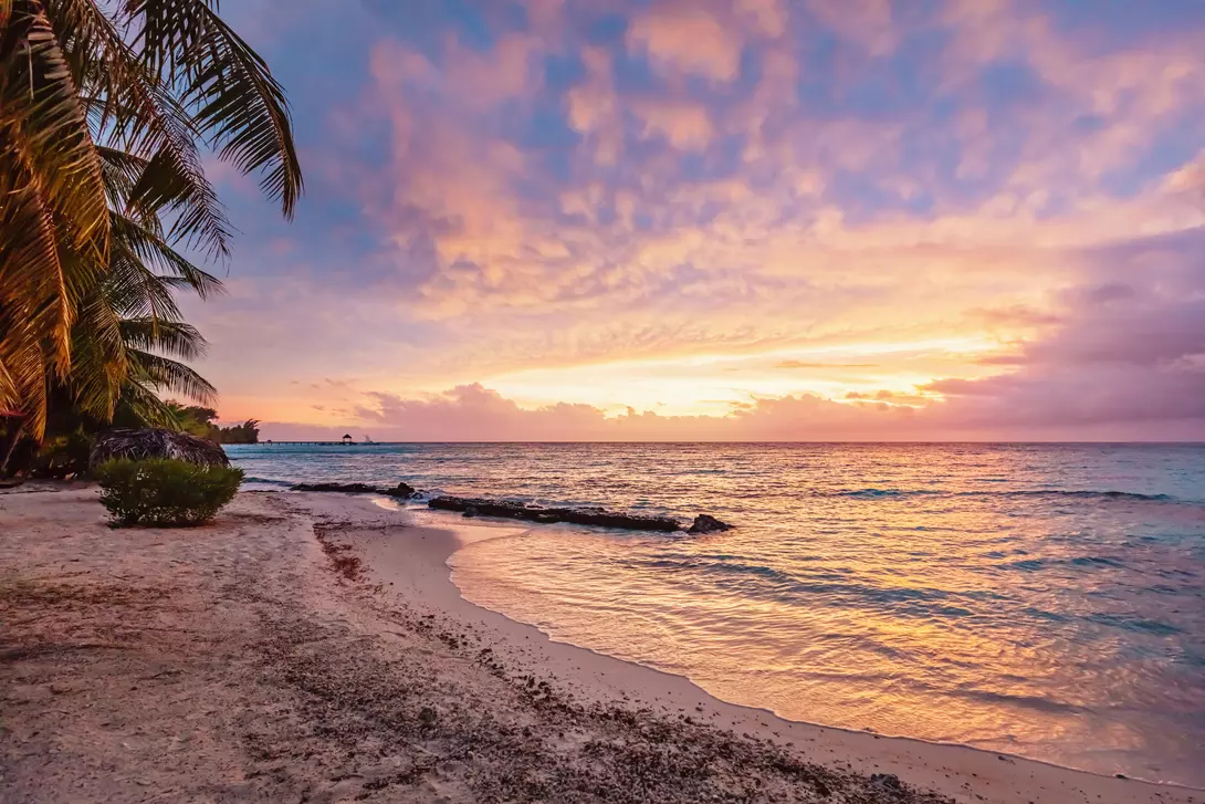 Colorful vibrant sunset over the pacific ocean at scenic natural beach
