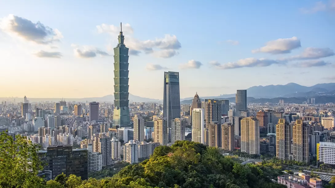 Taipei city viewed from the Mount Elephant in the evening, featuring Taipei 101 skyscraper