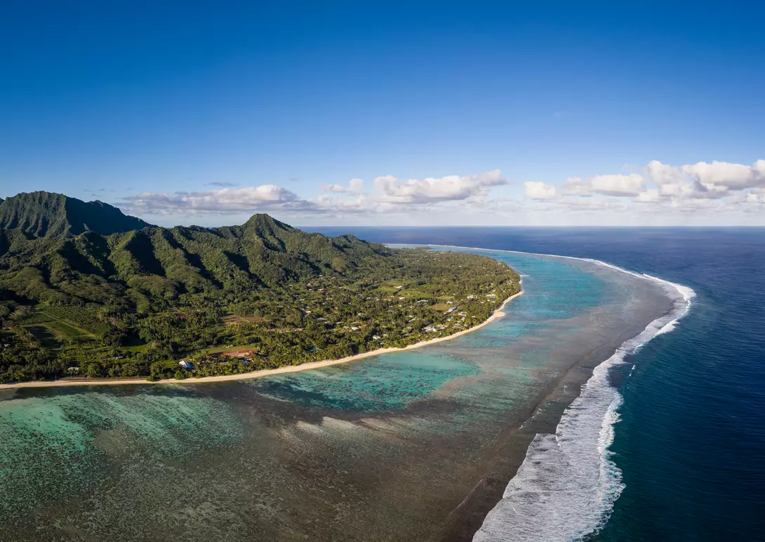 Rarotonga island, part of the Cook islands, in the Pacific ocean, with its jungle covered mountain and stunning beach