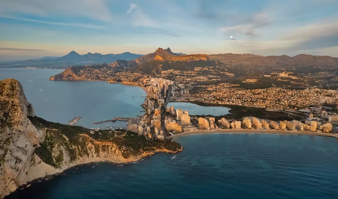 Aerial shot of rocky cliff Penyal d Ifac Natural Park, Province of Alicante, Costa Blanca. Spain