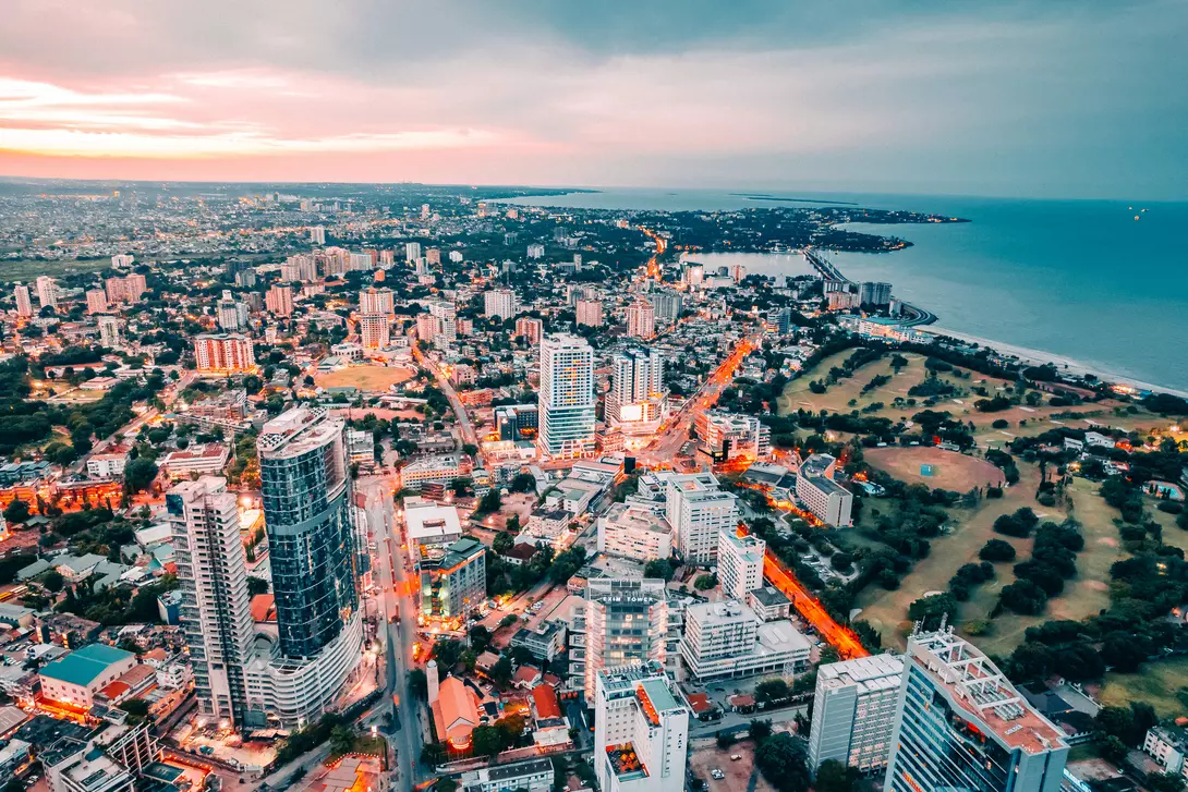 A Drone shot of the capital city of Tanzania, Dar es salaam, view from above. The Brand. Found in East Africa. The city centre located in Posta showing ocean view and the whole city