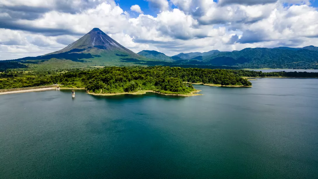 Arenal Lake sits at the base of the active Arenal Volcano.