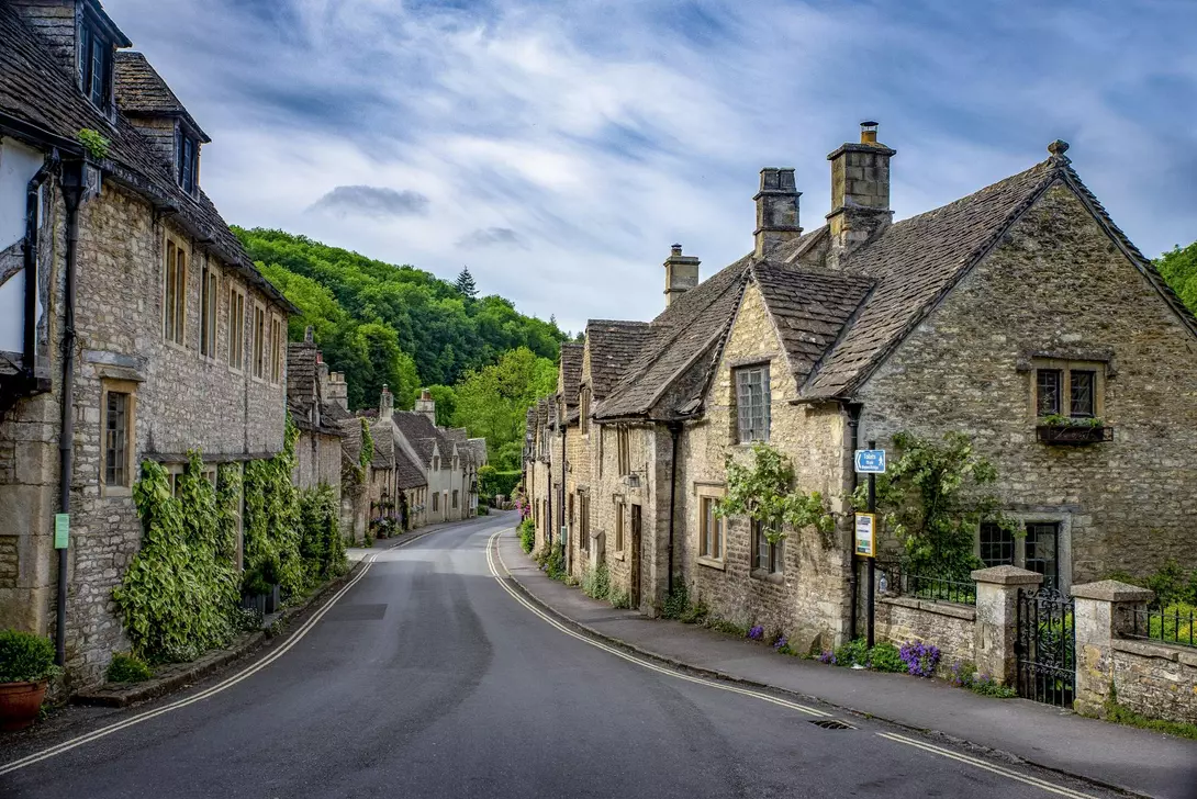 Cotswolds, England A shot of brick stone houses on the Main Street