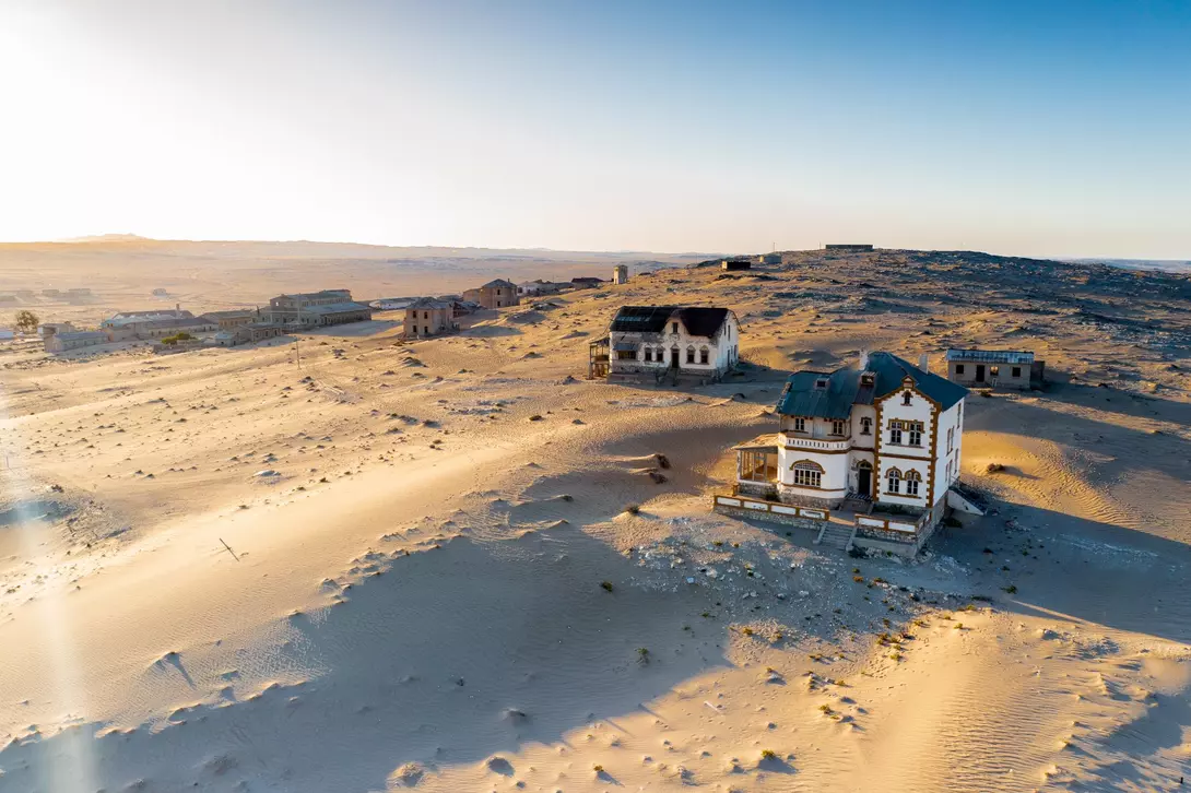 Deserted homes in Kolmanskop ghost town near Luderitz in Namibia, the site of an abandoned diamond mine