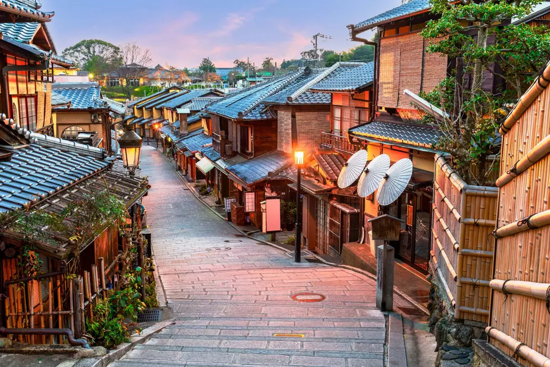 Traditional winding street in Gion, Kyoto, Japan at dawn