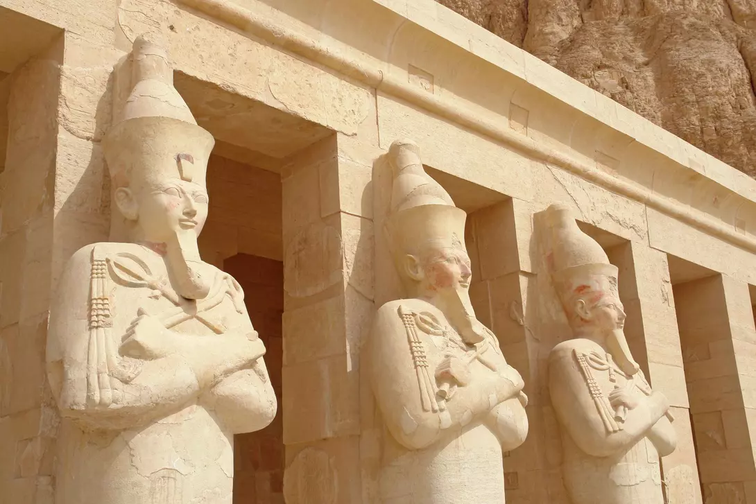 Egypt Three statues in the temple of Queen Hatshepsut in Valley of kings