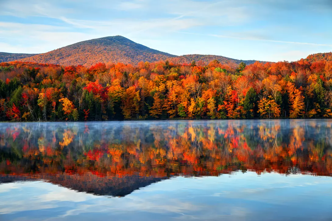 Lake Bomoseen, Vermont Calm tranquil colorful morning over the lake during the peak autumn foliage season