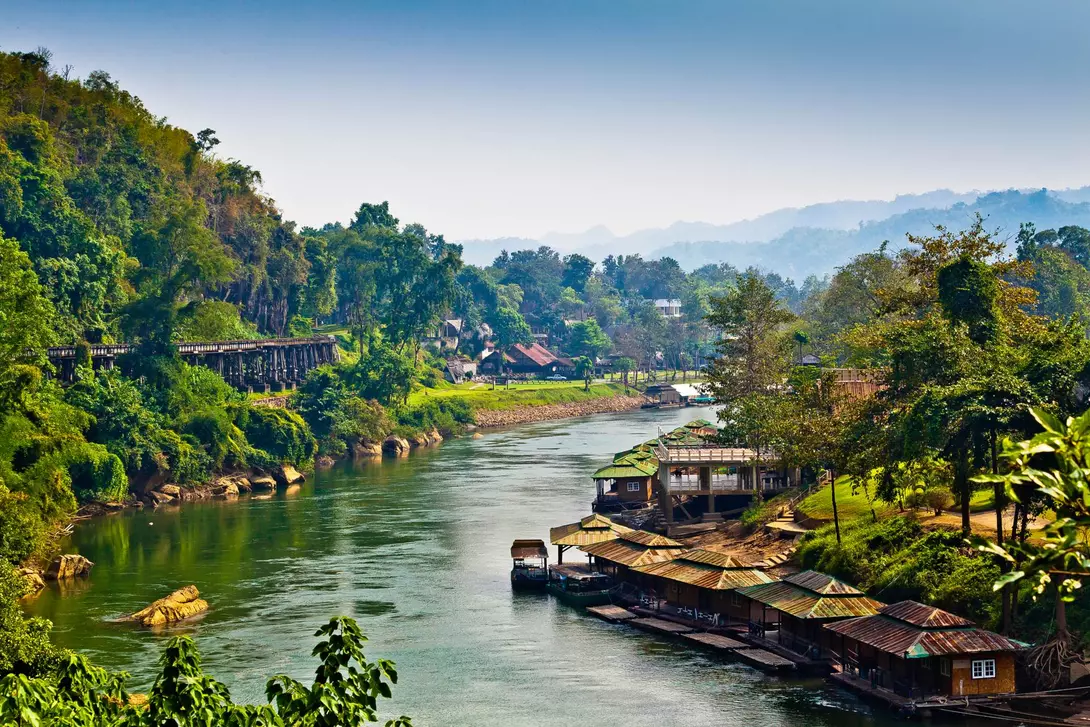 River winds between rural villages