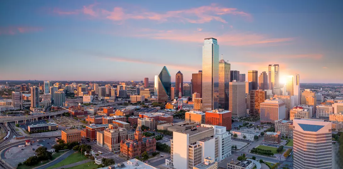 the city skyline of Dallas, Texas at sunset